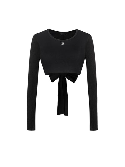 Black long-sleeve crop top with a tie detail on a white background