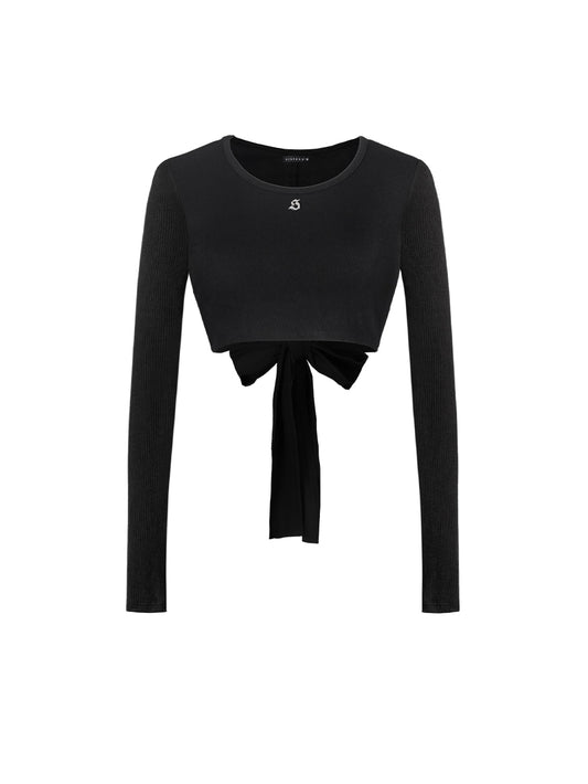 Black long-sleeve crop top with a tie detail on a white background