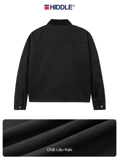 Black jacket with Hiddle branding and fabric texture detail on a white background