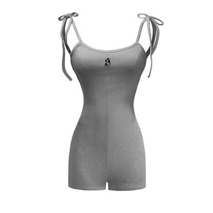Gray romper with thin straps on a white background