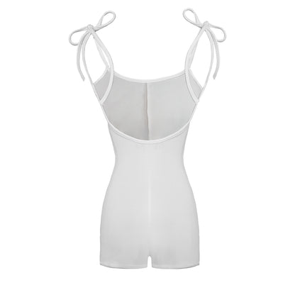 White bodysuit with thin straps on a white background
