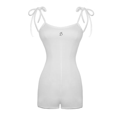 White ribbed bodysuit with thin straps on a white background