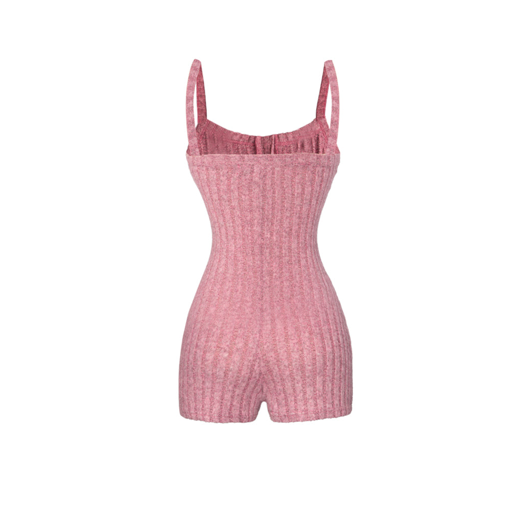 Pink ribbed romper on a white background