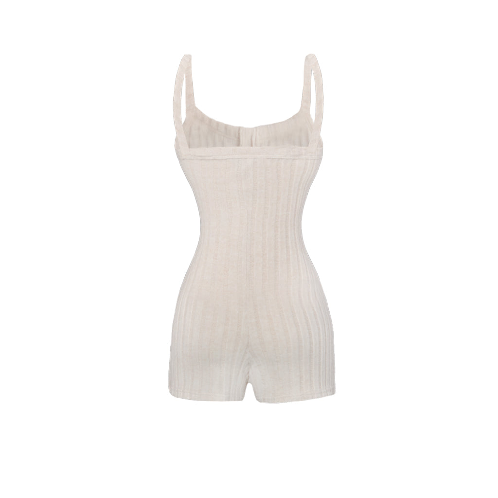 Beige ribbed romper on a white background