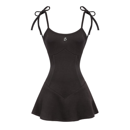 Black dress with tied straps on a white background