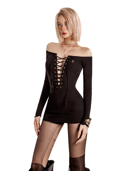 Woman wearing a black off-shoulder dress with lace-up details on a white background