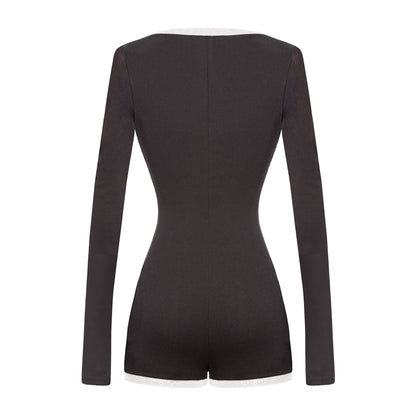 Black bodysuit with long sleeves on a white background