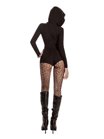 Person wearing a black hooded outfit with fishnet stockings and high boots on a white background