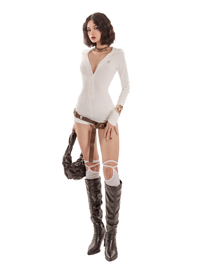 Person wearing a white outfit with brown boots on a white background