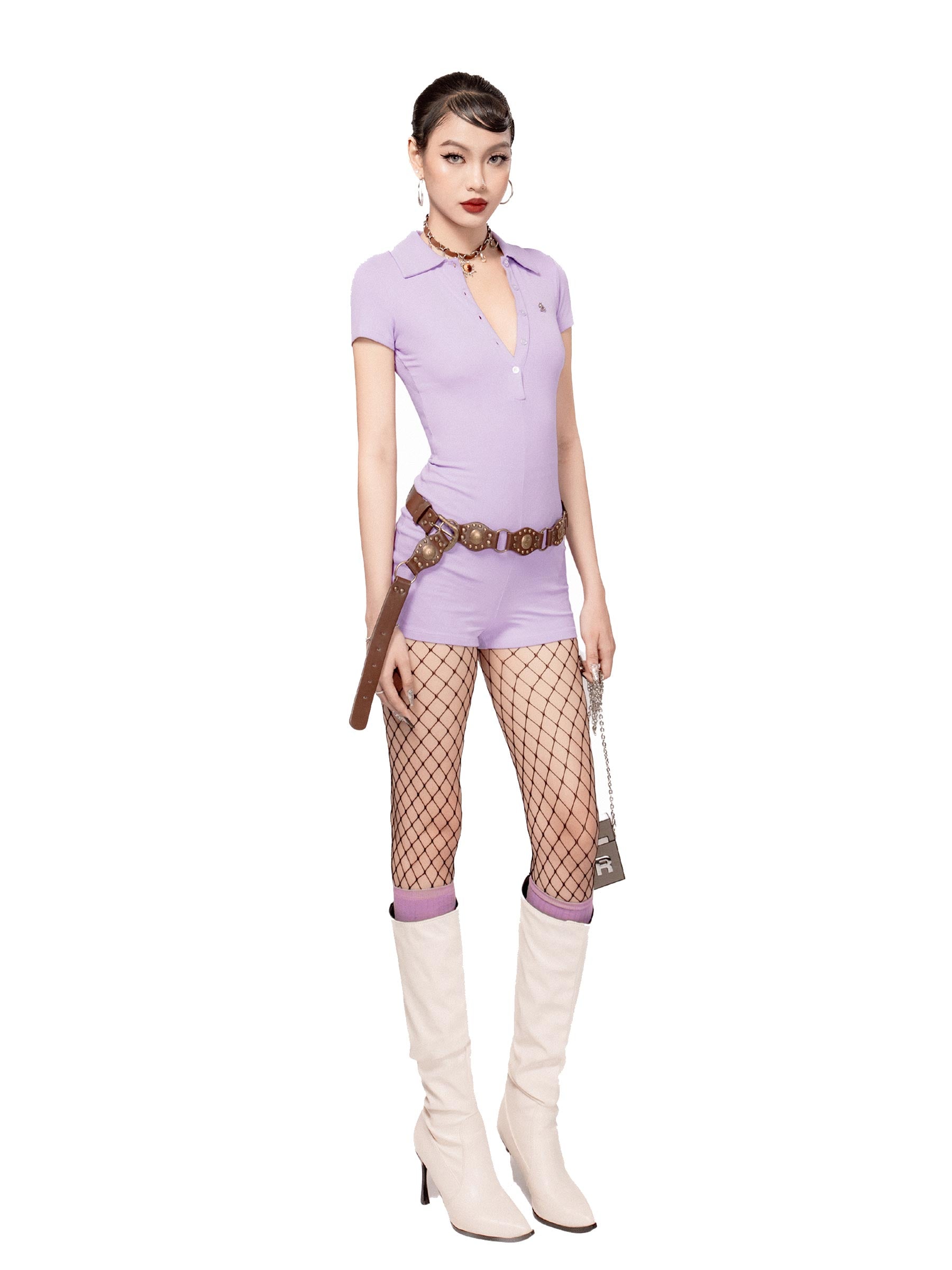 Woman wearing a lavender outfit with fishnet stockings and high boots on a white background