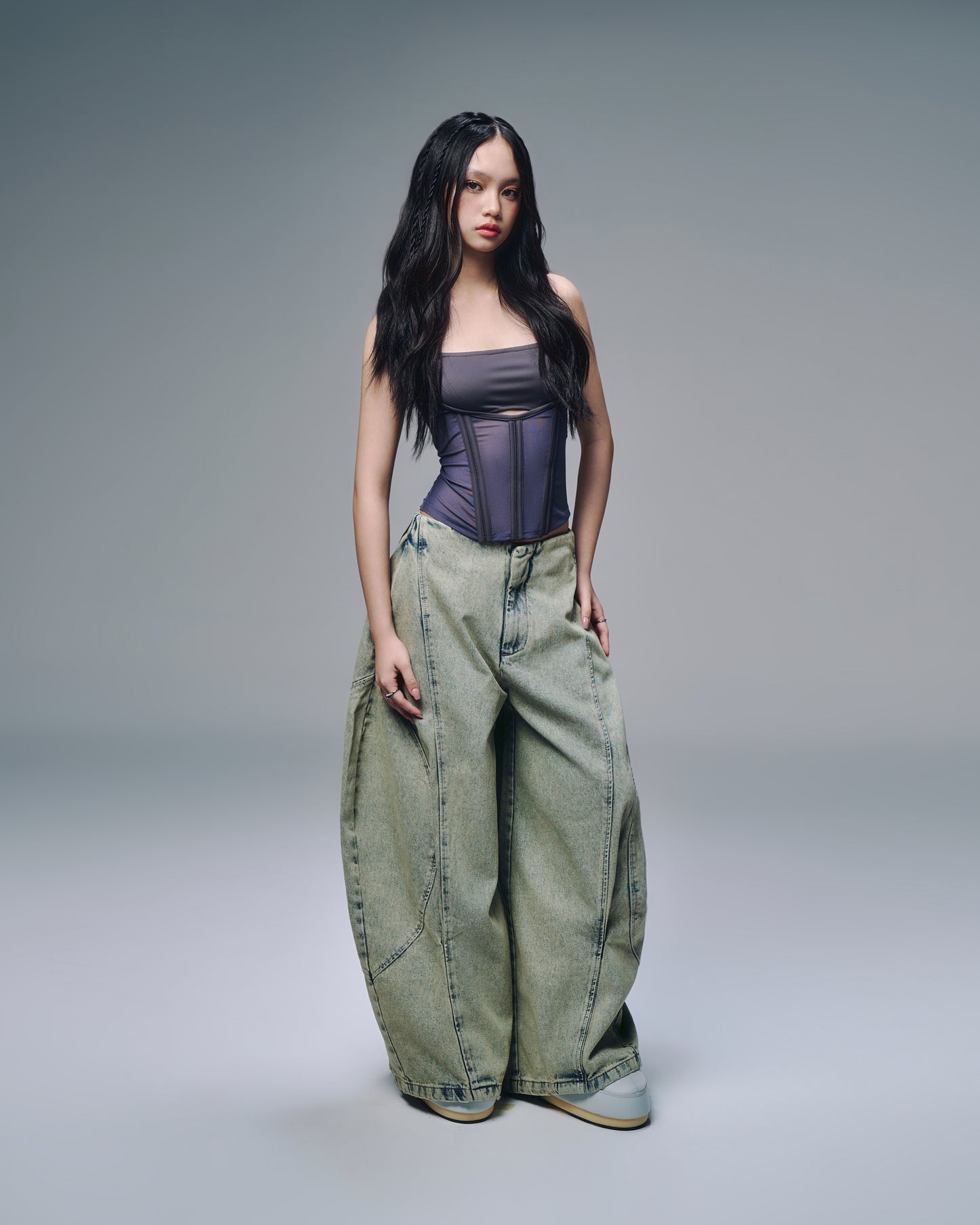 Styled mesh top with layered outfit – minimalist street look