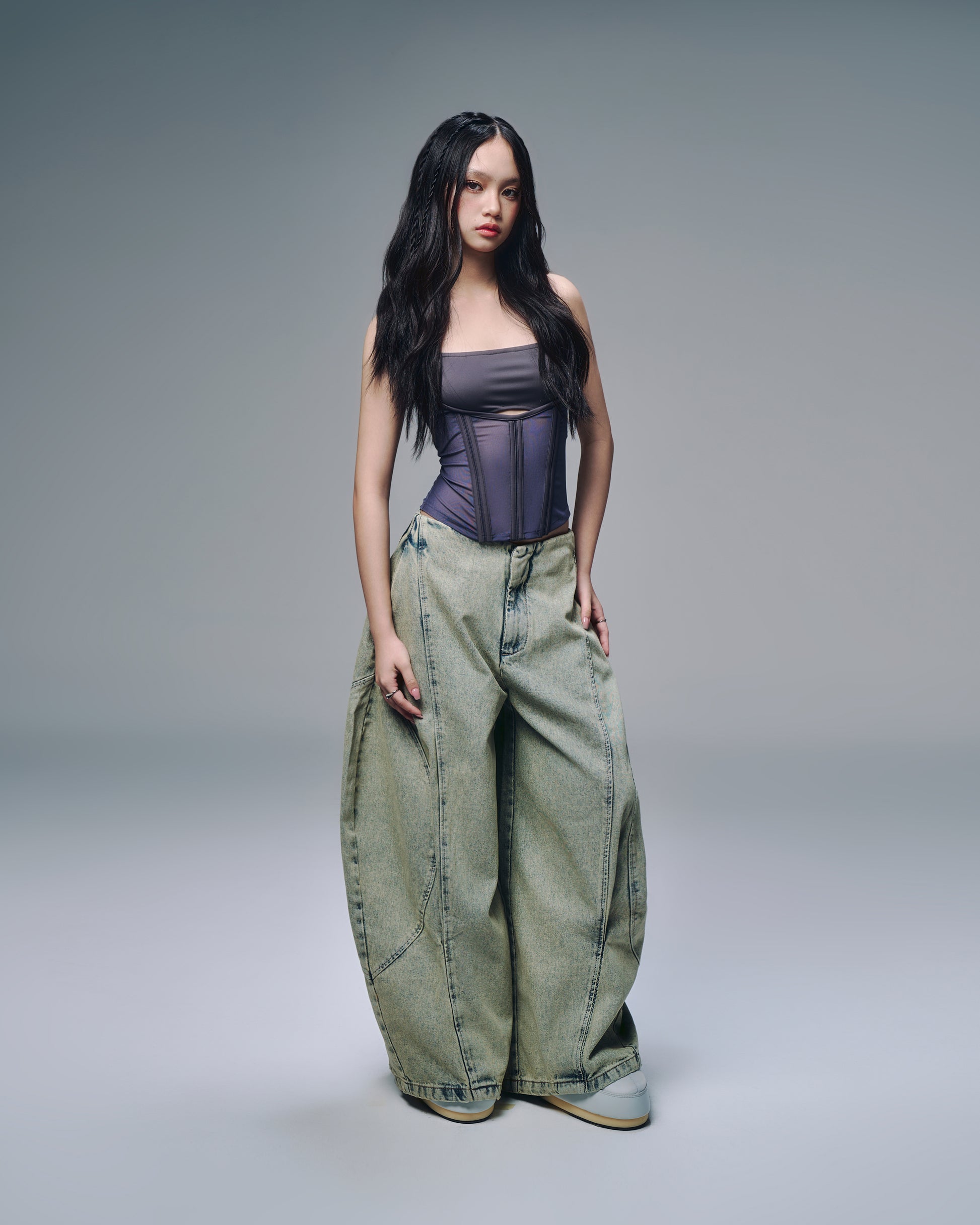Styled mesh top with layered outfit – minimalist street look