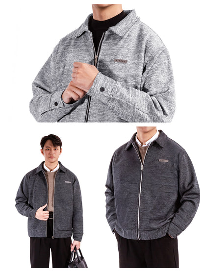 Gray jacket worn by a person on a white background
