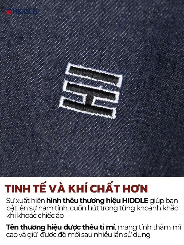Close-up of a denim fabric with a logo and text in Vietnamese.