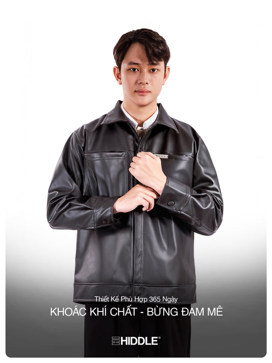 Man wearing a black leather jacket with 'Hiddle' branding on a white background