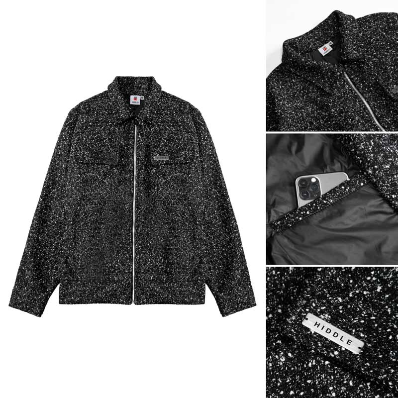 Black speckled jacket with a brand logo on a white background