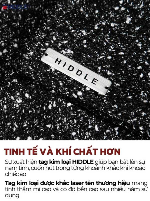 Metallic tag with 'Hiddle' brand name on a textured black background