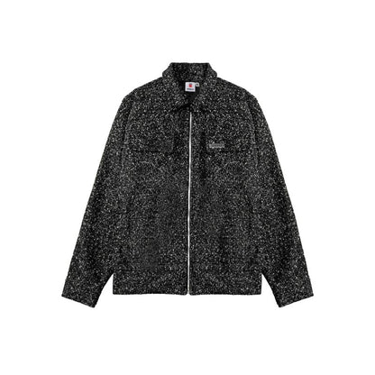 Black speckled jacket on a white background