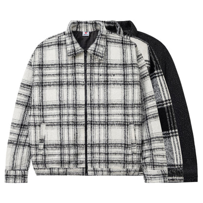 Plaid shirt with black sleeves on a white background