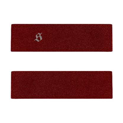 Two red headbands with a silver 'S' logo on a white background