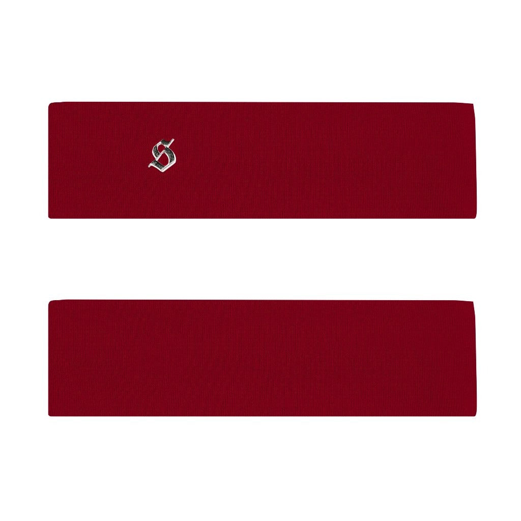 Two red headbands with a silver logo on a white background