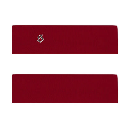 Two red headbands with a silver logo on a white background