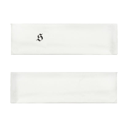 White rectangular tile with a black letter 'S' on a white background