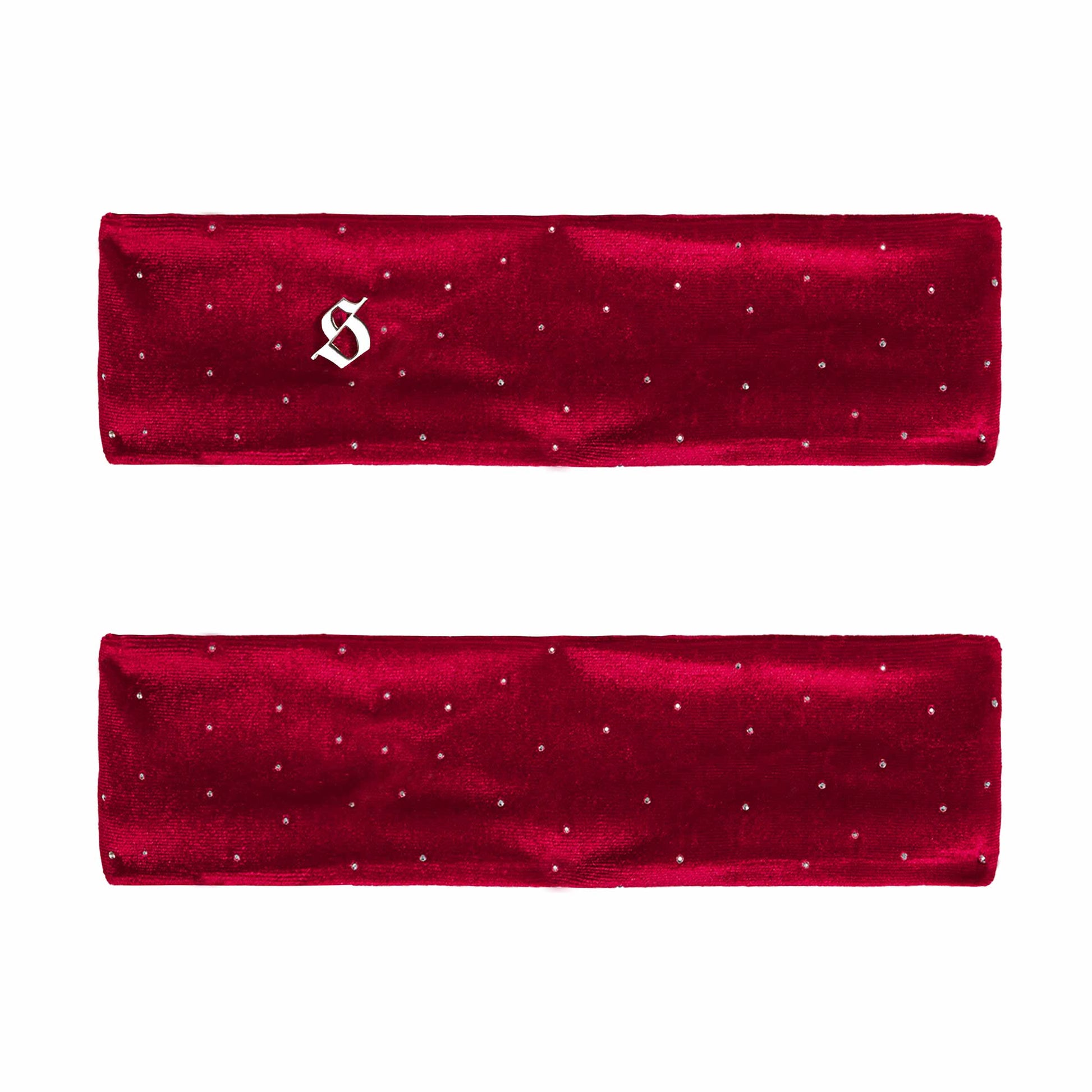 Two red satin headbands with small white embellishments on a white background