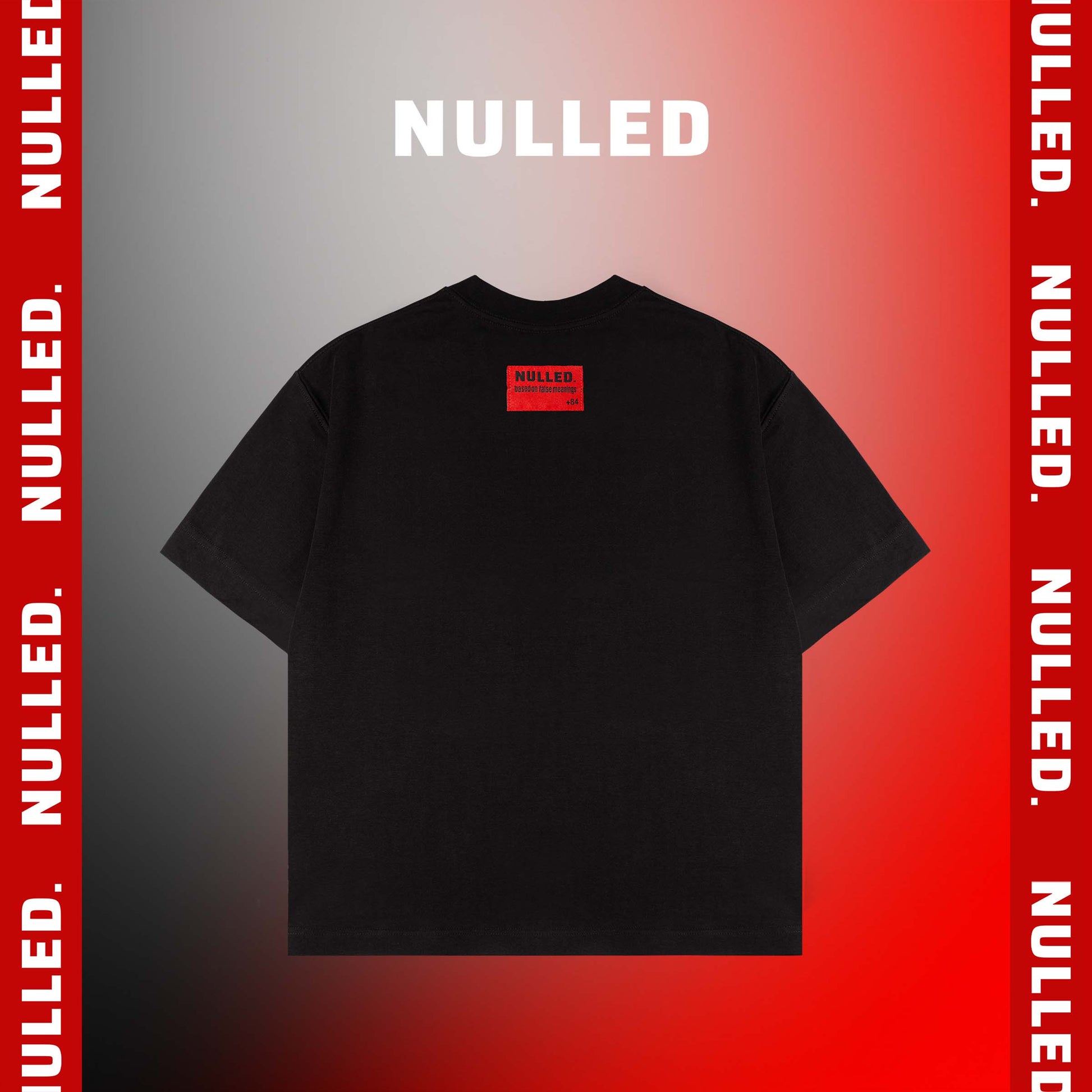 Black t-shirt with a red label on a gray to red gradient background with 'NULLED' branding.