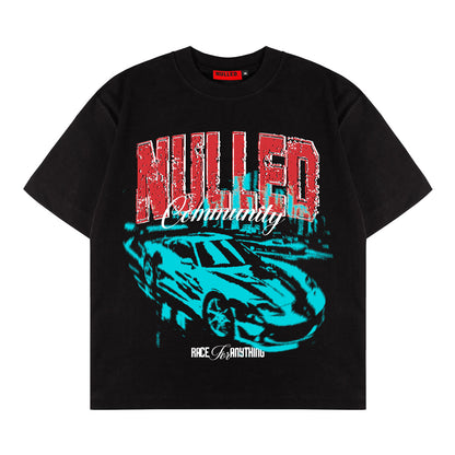 Black t-shirt with red and white text and a blue car graphic on a white background