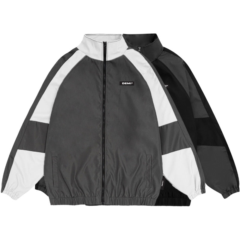 Black and white jacket with 'Demi' branding on a white background