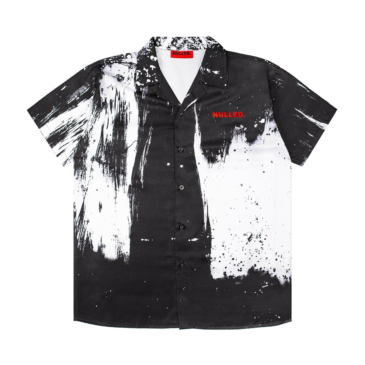 Black and white splatter pattern shirt with 'WULLED' branding on a white background