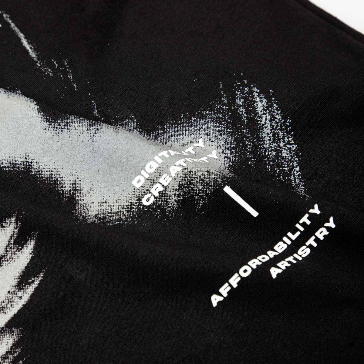 Black t-shirt with white text and abstract design on a black background