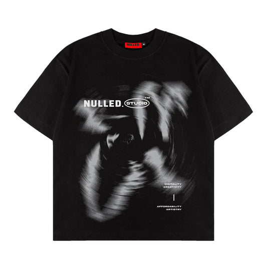 Black t-shirt with a graphic design and 'NULLED STUDIO' branding on a white background