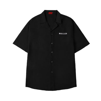 Black shirt with 'NULLED' logo on a white background