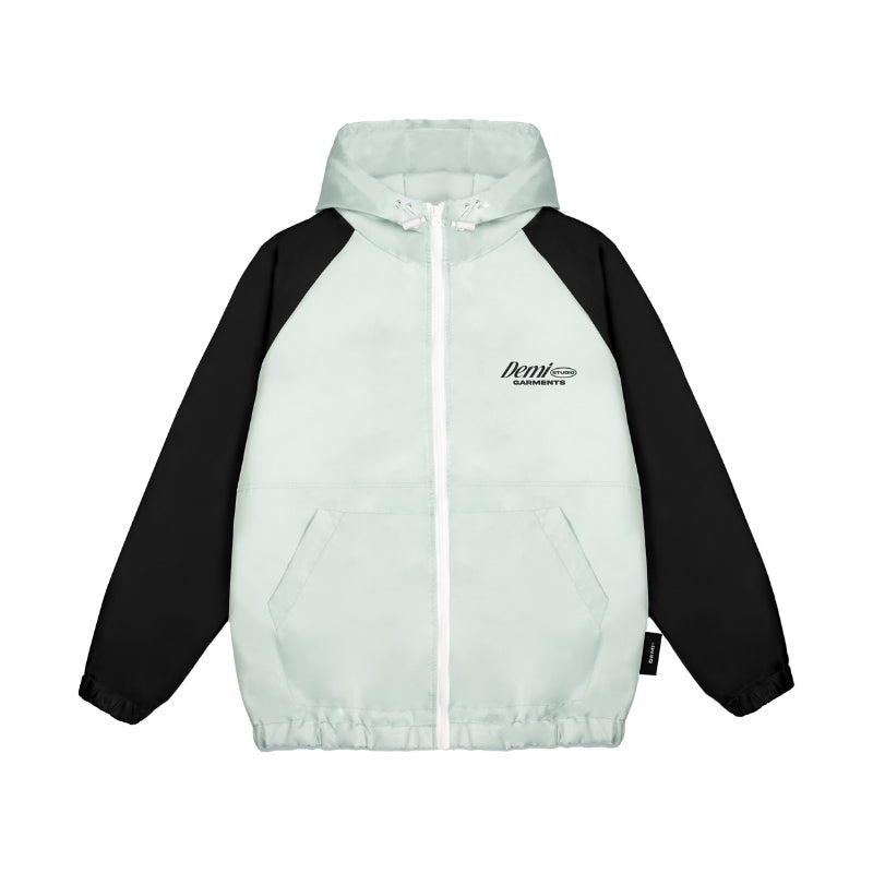 Light blue and black jacket with a hood on a white background
