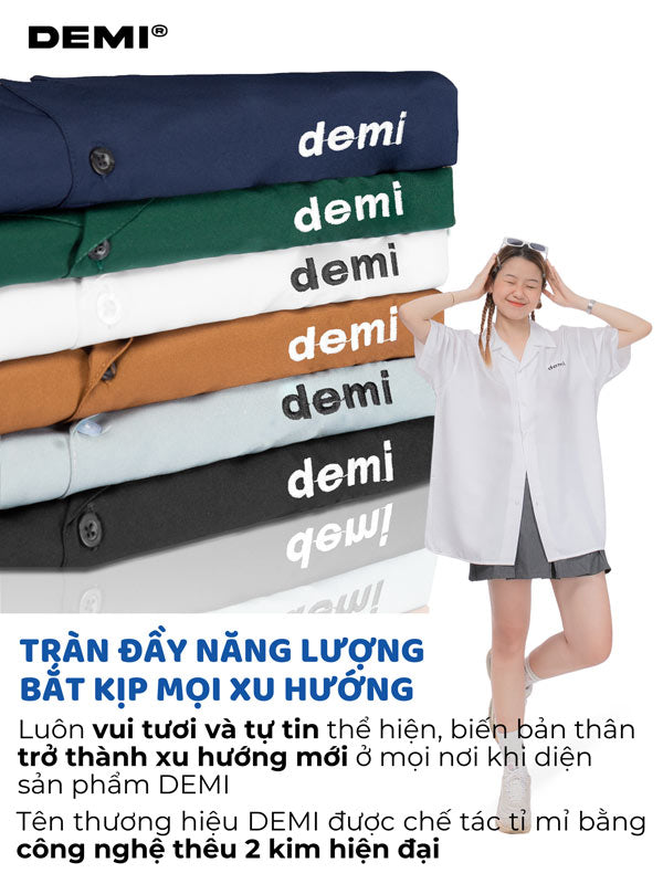 Woman standing next to a stack of DEMI shirts with text about the brand's energy and trendiness.