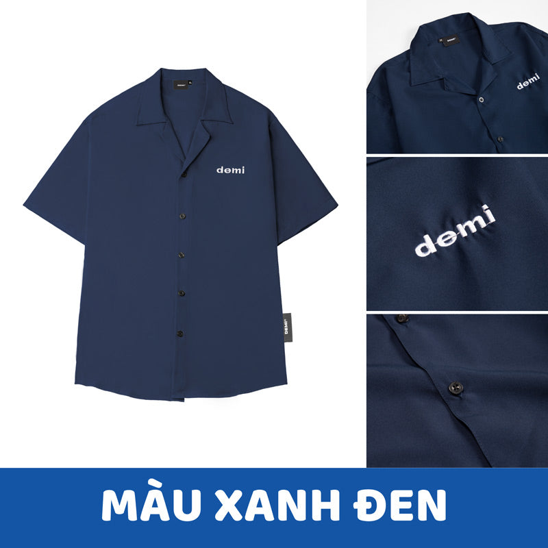 Navy blue shirt with 'demi' branding on a white background