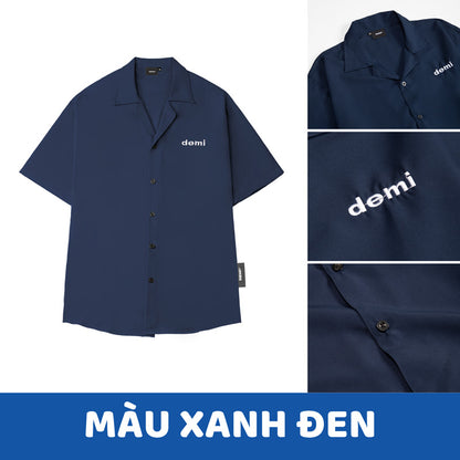 Navy blue shirt with 'demi' branding on a white background