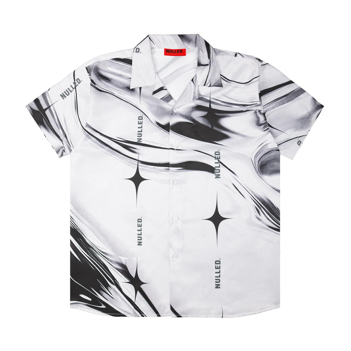 White shirt with black abstract patterns and 'NULED' branding on a white background