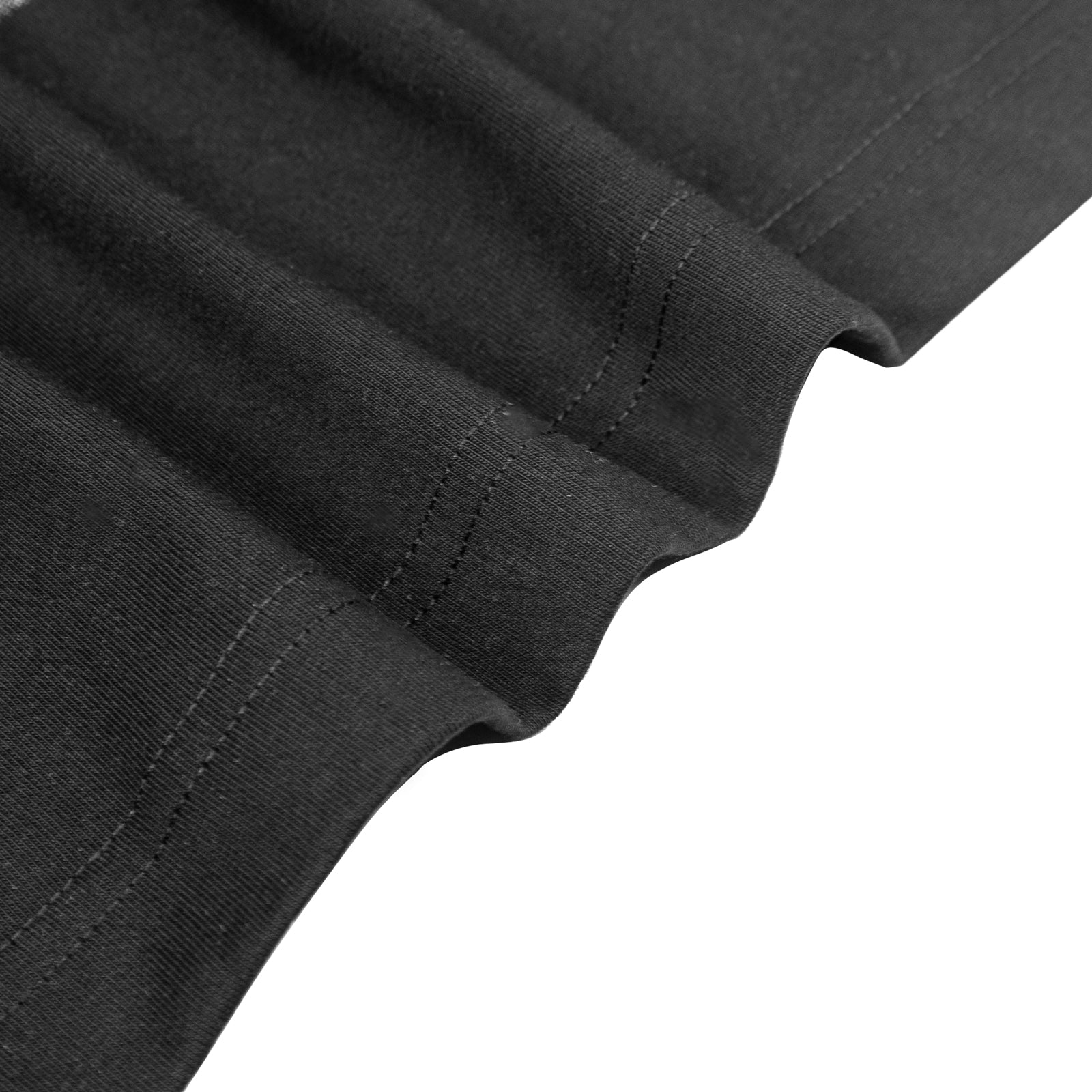 Close-up of a black fabric texture on a white background