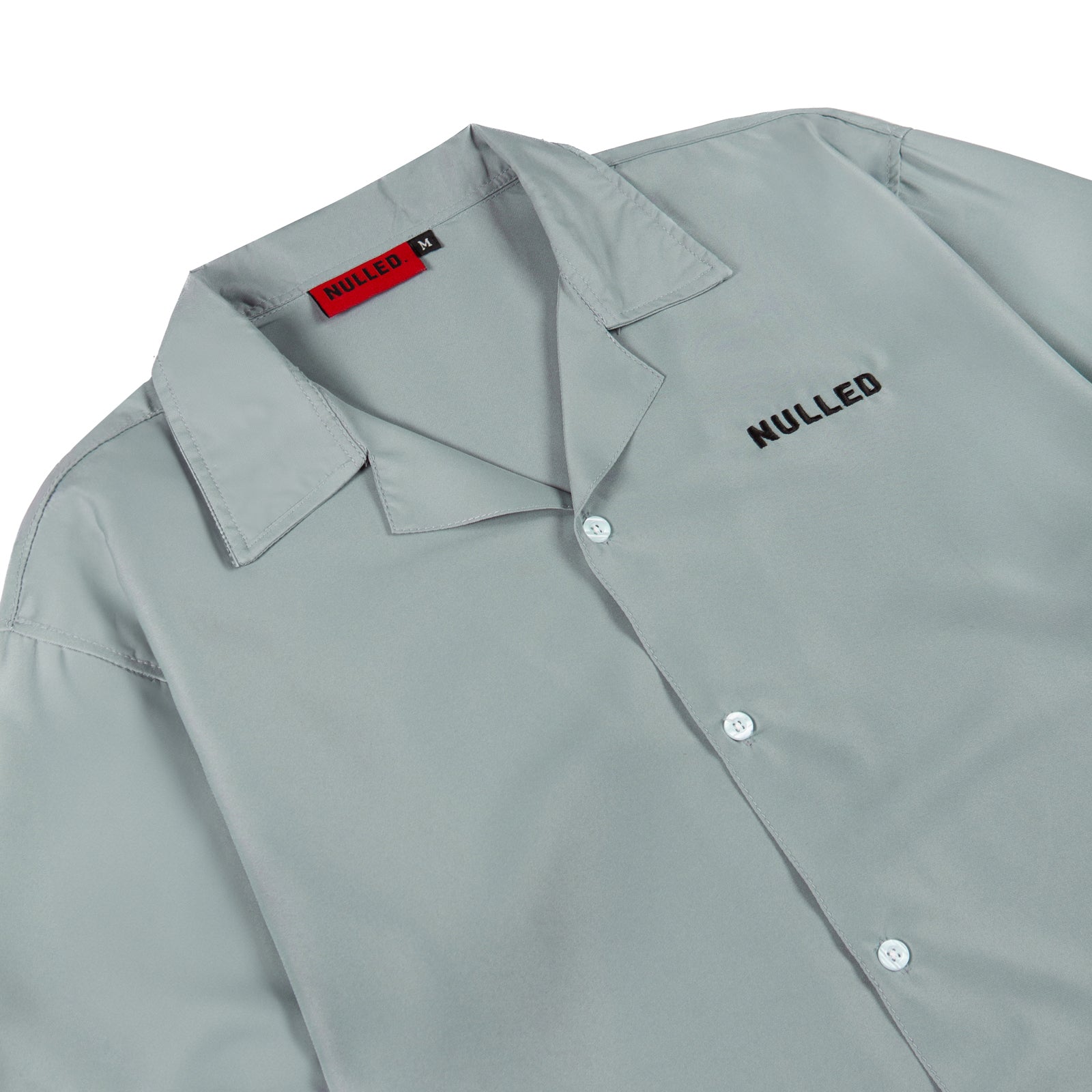 Gray shirt with 'Nulled' branding on a white background