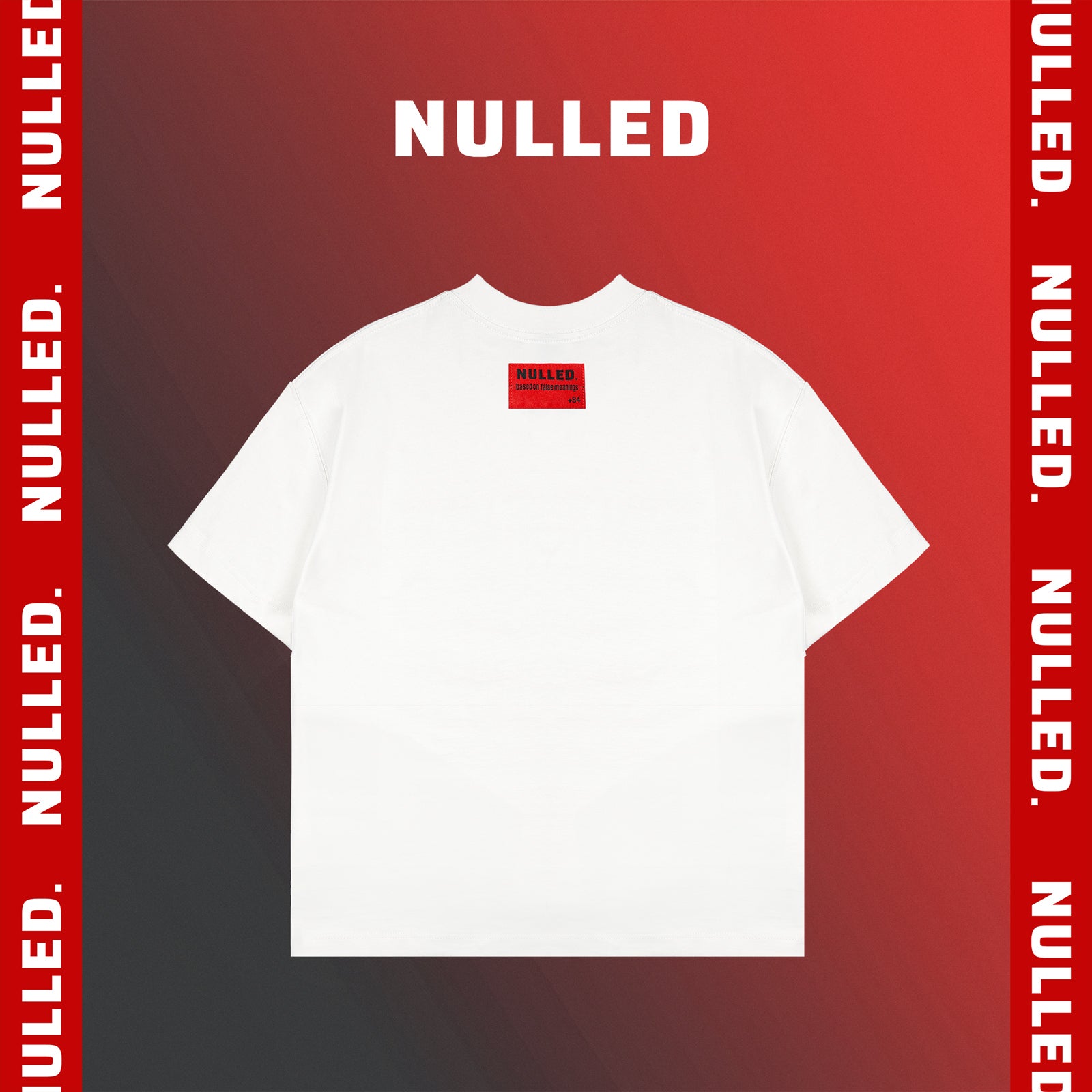White t-shirt with a red label on a red background with 'NULLED' text.