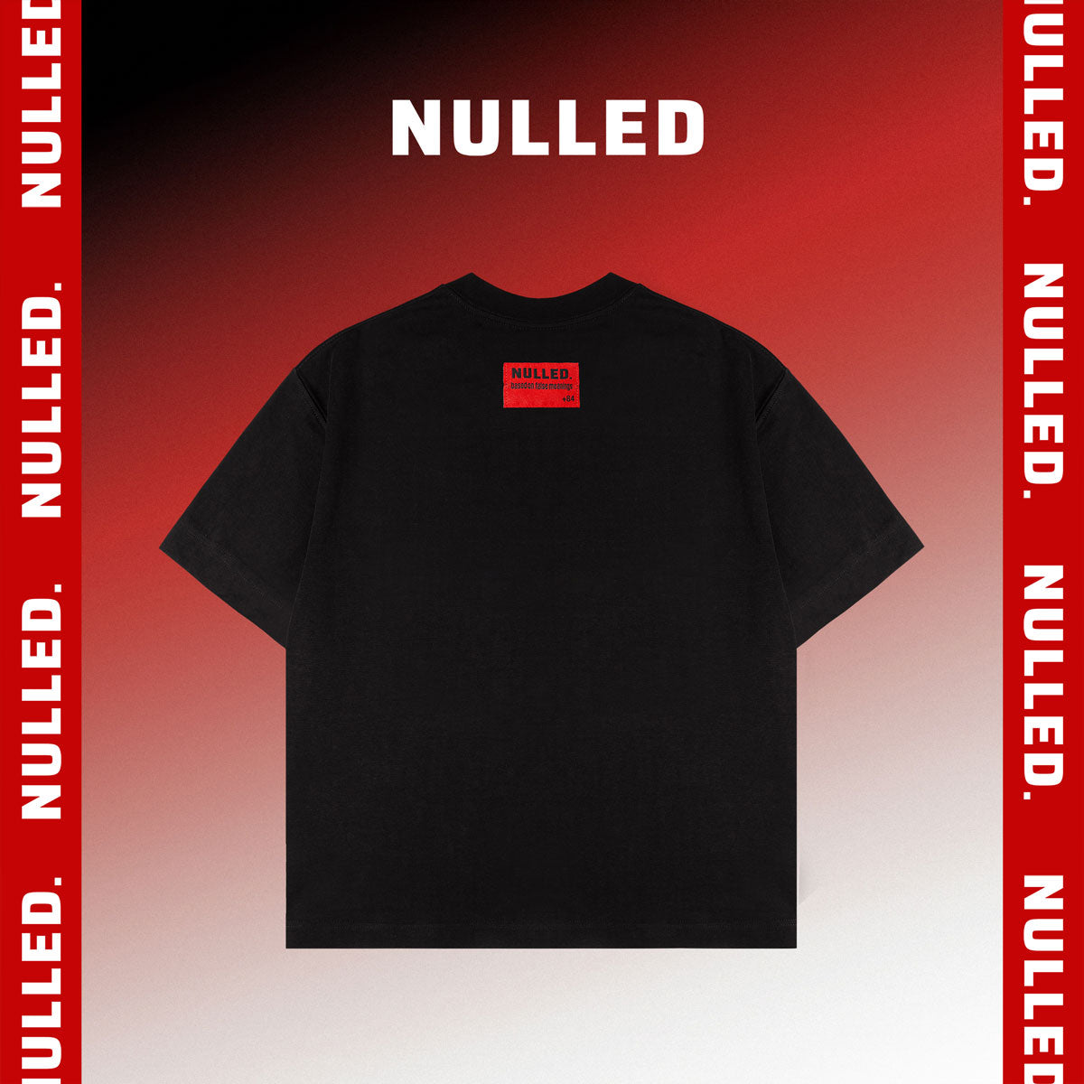 Black t-shirt with 'NULLED' branding on a red and white gradient background