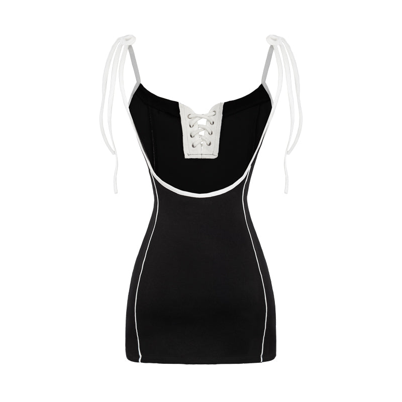 Black dress with white accents on a white background