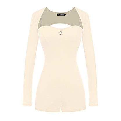 Beige long-sleeve top with a logo on a white background