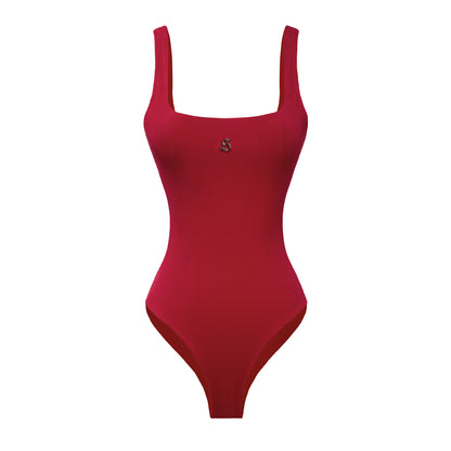 Red swimsuit with thin straps on a white background