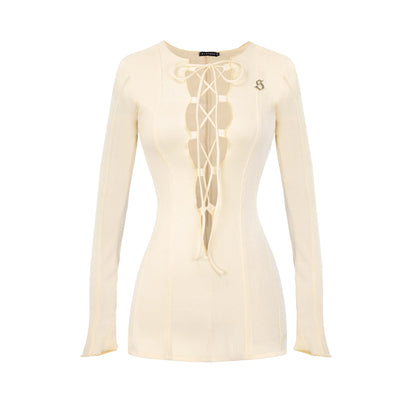 Beige long-sleeve top with lace-up front on a white background