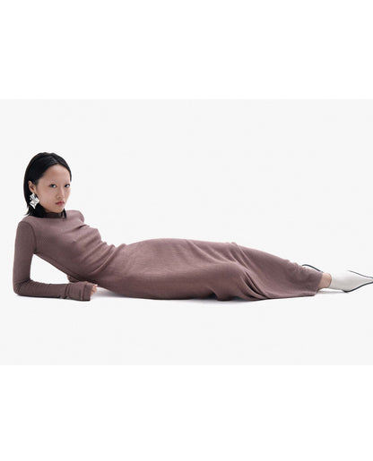 Side view of long-sleeve open-back dress