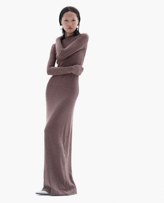 Model wearing backless ribbed knit maxi dress